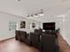 Home theater seating with theater screen, speakers, and windows at 2812 Windcrest Oaks Ct, Valrico, FL 33594