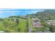 Aerial view of waterfront community adjacent to golf course at 2980 Haines Bayshore Rd # 105, Clearwater, FL 33760
