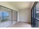 Covered balcony space between indoor and outdoor living at 2980 Haines Bayshore Rd # 105, Clearwater, FL 33760