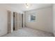 Bedroom has a window and a closet at 2980 Haines Bayshore Rd # 105, Clearwater, FL 33760