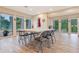 Community room featuring views of the pool and surrounding landscaped areas at 2980 Haines Bayshore Rd # 105, Clearwater, FL 33760