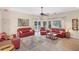 Spacious gathering room with comfortable furniture and expansive views of the pool at 2980 Haines Bayshore Rd # 105, Clearwater, FL 33760
