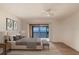 Stylishly furnished main bedroom with balcony access and scenic water views at 2980 Haines Bayshore Rd # 105, Clearwater, FL 33760