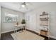 Inviting bedroom with natural light, wooden floors, and stylish decor at 3127 W Oakellar Ave, Tampa, FL 33611