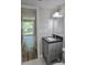 Bathroom with stylish vanity and modern fixtures, next to sliding glass doors at 3325 Bayshore Blvd # C14, Tampa, FL 33629