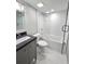 Updated bathroom with a shower-tub combo, modern vanity, and glass shower door at 3325 Bayshore Blvd # C14, Tampa, FL 33629