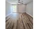 Relaxing bedroom featuring wood-look flooring and ceiling fan at 3325 Bayshore Blvd # C14, Tampa, FL 33629