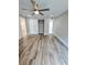 Light-filled bedroom with closet and wood-look flooring at 3325 Bayshore Blvd # C14, Tampa, FL 33629