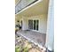 Covered outdoor patio area, brick columns, and sliding glass doors at 3325 Bayshore Blvd # C14, Tampa, FL 33629