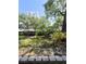 Outdoor patio view of landscaping and high rise building at 3325 Bayshore Blvd # C14, Tampa, FL 33629
