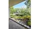 Outdoor patio view of landscaping and high rise building at 3325 Bayshore Blvd # C14, Tampa, FL 33629
