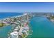 Coastal home with waterfront access and beautiful city views in the distance at 340 Bay Plaza, Treasure Island, FL 33706