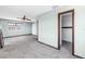 This bedroom offers carpet floors, ceiling fan and a walk-in closet at 340 Bay Plaza, Treasure Island, FL 33706