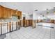 Spacious kitchen featuring tile flooring, wood cabinets, and ready for customization at 340 Bay Plaza, Treasure Island, FL 33706