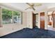 Bedroom featuring a window and a closet with an adjacent sink at 4025 Chesswood Dr, Holiday, FL 34691