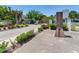 Legacy Park entrance with brick-paved road, mature landscaping, and gated access at 4503 Legacy Park Dr, Tampa, FL 33611