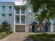 Charming townhome featuring a private garage and quaint balconies, perfect for enjoying Florida's sunshine at 4503 Legacy Park Dr, Tampa, FL 33611