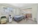 Bright bedroom with natural light, sliding glass doors and vinyl flooring, ready for relaxation at 4720 Coronado S Way, Gulfport, FL 33711