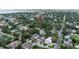 Aerial view of a tree-filled neighborhood with various styles of homes, denoted by a red pin at 4901 W Estrella St, Tampa, FL 33629