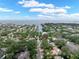 Aerial view showing waterfront neighborhood, canal access, with location denoted by red marker pin at 4901 W Estrella St, Tampa, FL 33629