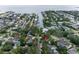 Drone shot showcasing waterfront neighborhood, canal access, and location denoted by red pin at 4901 W Estrella St, Tampa, FL 33629