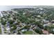 Aerial photo showing the property with neighborhood, trees, and access to water denoted by red pin at 4901 W Estrella St, Tampa, FL 33629