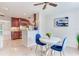Inviting breakfast nook featuring modern lighting, a bright decor and easy access to the kitchen at 4901 W Estrella St, Tampa, FL 33629