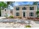 Charming home featuring well-manicured landscaping and a covered front entry at 4901 W Estrella St, Tampa, FL 33629