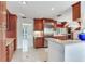 Well-equipped kitchen with stainless steel appliances, a peninsula, granite countertops and lots of storage at 4901 W Estrella St, Tampa, FL 33629
