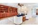 Inviting living room featuring custom built-ins, plush seating, and warm, neutral tones at 4901 W Estrella St, Tampa, FL 33629