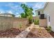 This outdoor space boasts brick pavers and mature landscaping at 4901 W Estrella St, Tampa, FL 33629