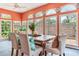 Charming sun room featuring natural light, modern table setting, and neutral tones at 4901 W Estrella St, Tampa, FL 33629