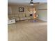 Spacious living room with wood floors, ceiling fan, and comfortable seating at 534 N Larry Cir, Brandon, FL 33511