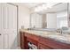 Bathroom vanity featuring granite countertop and ample storage at 5633 Puerta Del Sol S Blvd # 310, St Petersburg, FL 33715