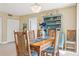 Bright dining area with stylish furniture and a crystal chandelier at 5633 Puerta Del Sol S Blvd # 310, St Petersburg, FL 33715