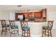 Kitchen island with seating and modern stainless-steel appliances at 5633 Puerta Del Sol S Blvd # 310, St Petersburg, FL 33715