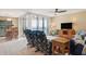 Bright living room with a water view, comfortable seating, and a ceiling fan at 5633 Puerta Del Sol S Blvd # 310, St Petersburg, FL 33715