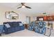 Inviting living room with tile floors and comfortable seating at 5633 Puerta Del Sol S Blvd # 310, St Petersburg, FL 33715