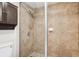 Shower featuring tile surround, shower head and glass door at 5633 Puerta Del Sol S Blvd # 310, St Petersburg, FL 33715