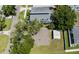 Aerial view of house showing backyard, shed, and trees at 7516 S Obrien St, Tampa, FL 33616