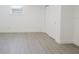 Bedroom with neutral paint, new flooring and closet at 7516 S Obrien St, Tampa, FL 33616