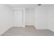 Bedroom with neutral paint, base board trim and new flooring at 7516 S Obrien St, Tampa, FL 33616