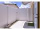 Enclosed patio area with a white privacy fence, offering a private outdoor space at 7542 Armand Cir, Tampa, FL 33634