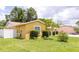 Spacious backyard with a well-manicured lawn, providing an ideal outdoor living space at 7542 Armand Cir, Tampa, FL 33634
