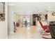 Bright and spacious dining area featuring tile flooring, neutral walls and modern lighting at 7542 Armand Cir, Tampa, FL 33634