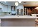 Modern kitchen with white cabinets, stainless steel appliances, and a spacious island at 9481 Highland Oak Dr # 1308, Tampa, FL 33647