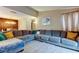 Comfortable living room with modern décor and open to dining area at 9481 Highland Oak Dr # 1308, Tampa, FL 33647