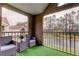 Relax on this screened patio with beautiful views of the pond and trees at 9481 Highland Oak Dr # 1308, Tampa, FL 33647
