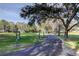 Scenic walking path winding through lush greenery, ideal for exercise and enjoying the outdoors at 9481 Highland Oak Dr # 1308, Tampa, FL 33647