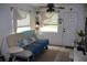 Inviting living area with comfortable seating, natural light, and tile flooring at 1006 Gray St, Plant City, FL 33563
